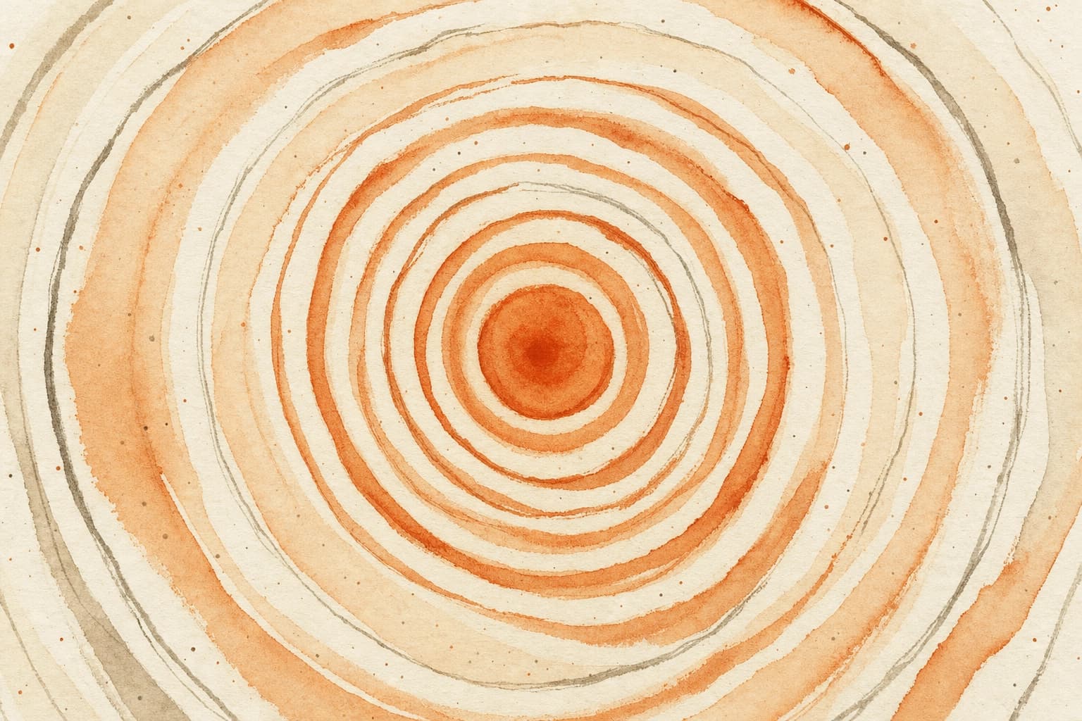 Concentric circles of warm orange ink radiating outward across cream paper.